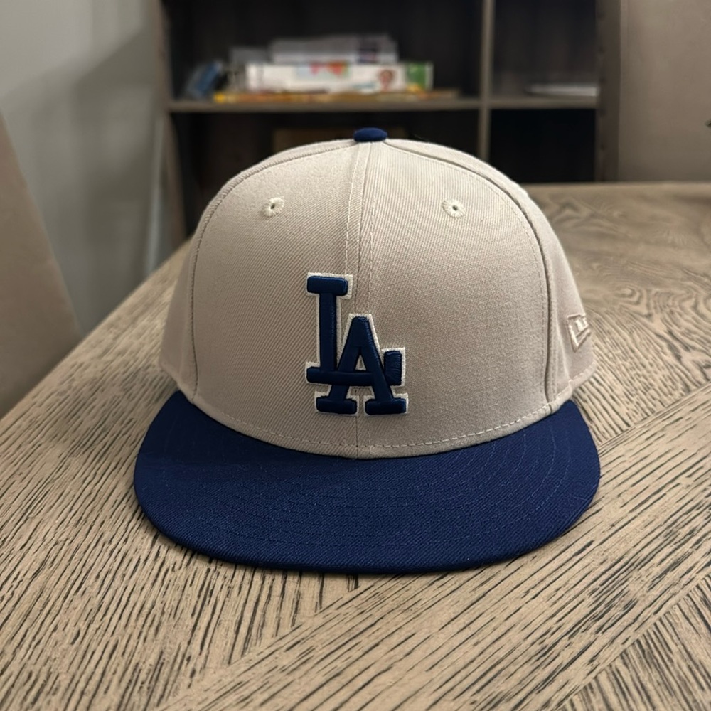 Brand new, never worn LA Dodgers hat. Downsizing my collection. Size 7